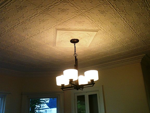 Tin ceiling in dining room.