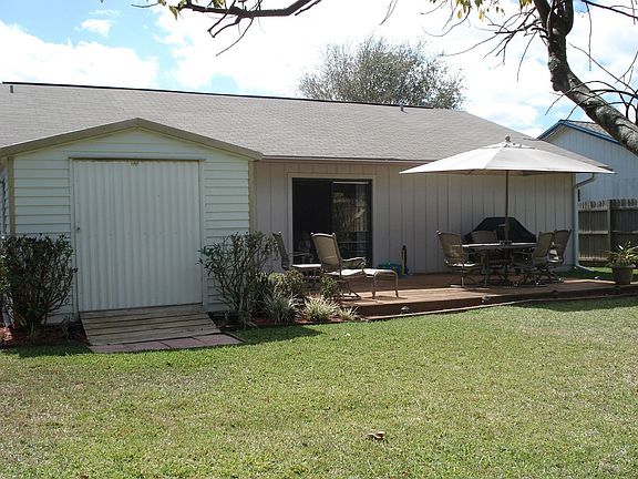 Rear of house showing deck and shed