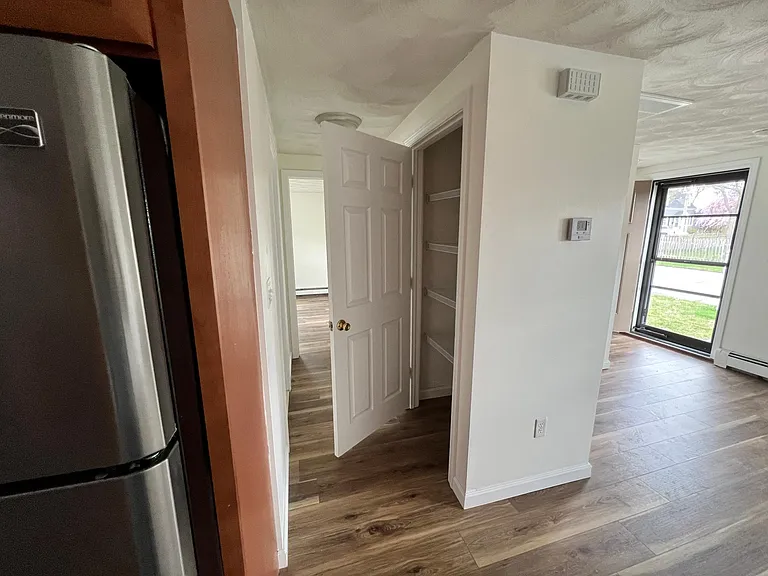Hallway to Bedroom 2, Bathroom and Pantry Closet