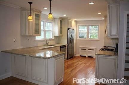 Back deck
						:
						Detached garage with new roof.