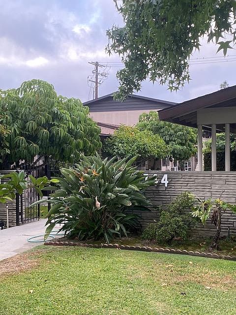 Street entry to unit C. Central walkway