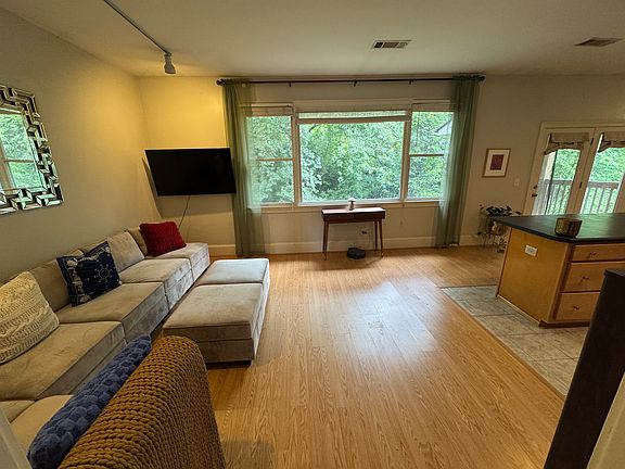 Great room with tv and outside view