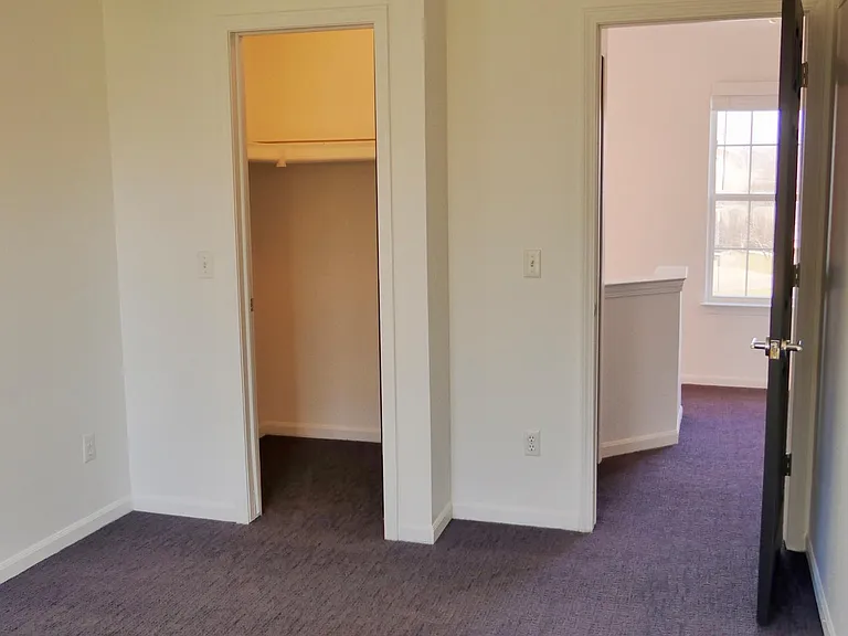 guest bedroom w/ walkin closet