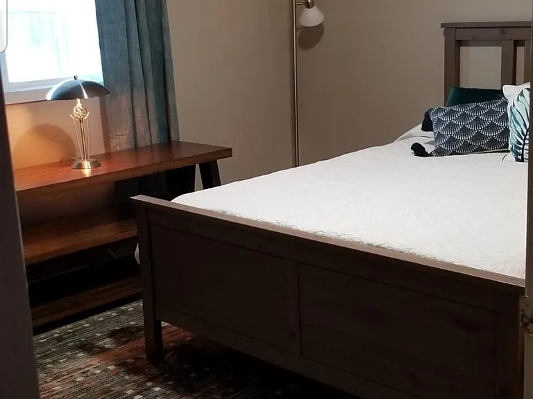 ground floor bedroom. Window looks out on the back yard and garden.