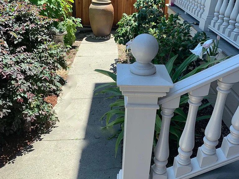 Garden in front of porch.