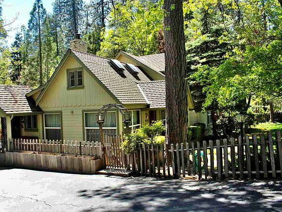 Large, spacious driveway and fenced in front and back yards.