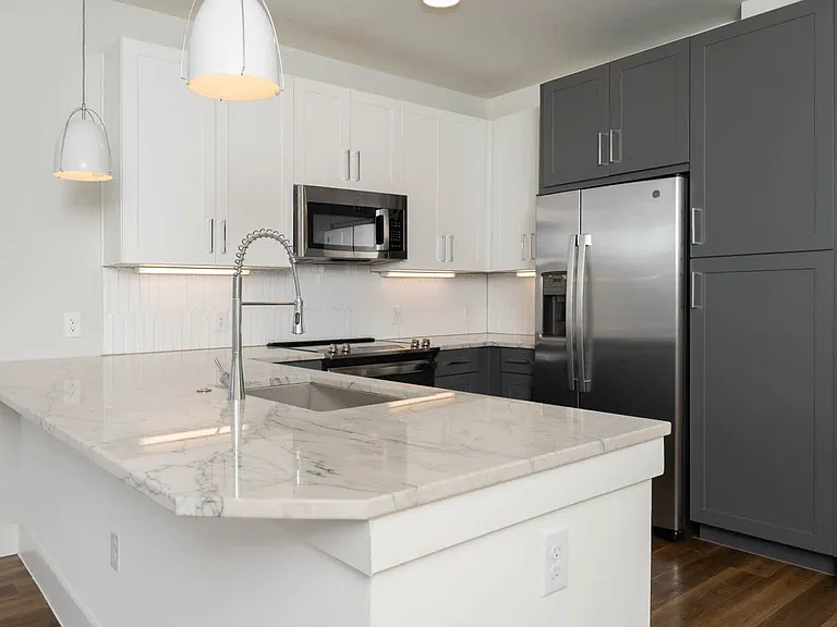 Kitchen with Stainless Steel Appliances and Quartz Countertops