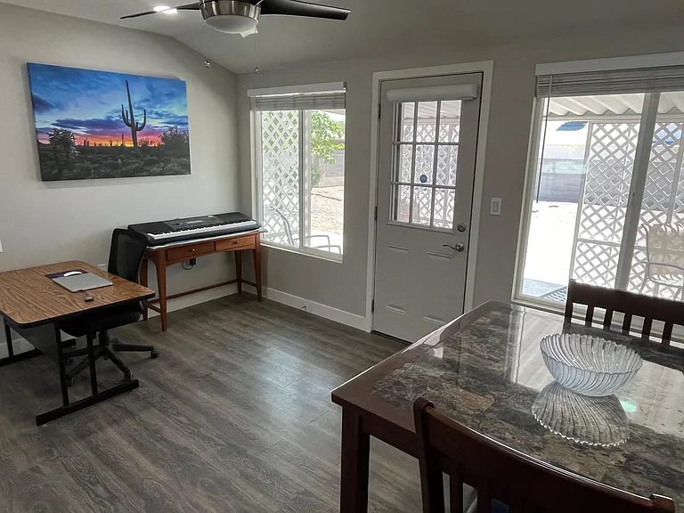 This office/Arizona room opens onto the covered back patio.