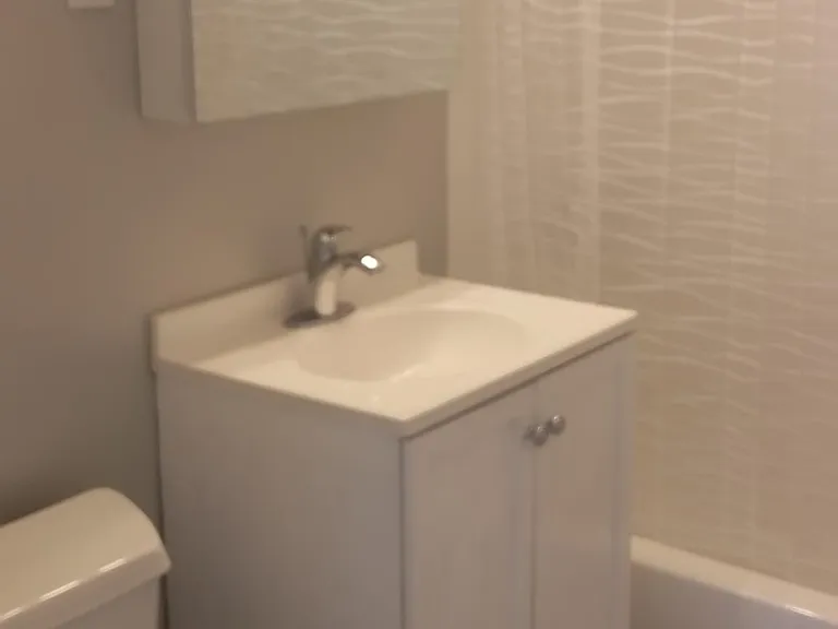 Bathroom 1 - Plenty of storage, nice bright light