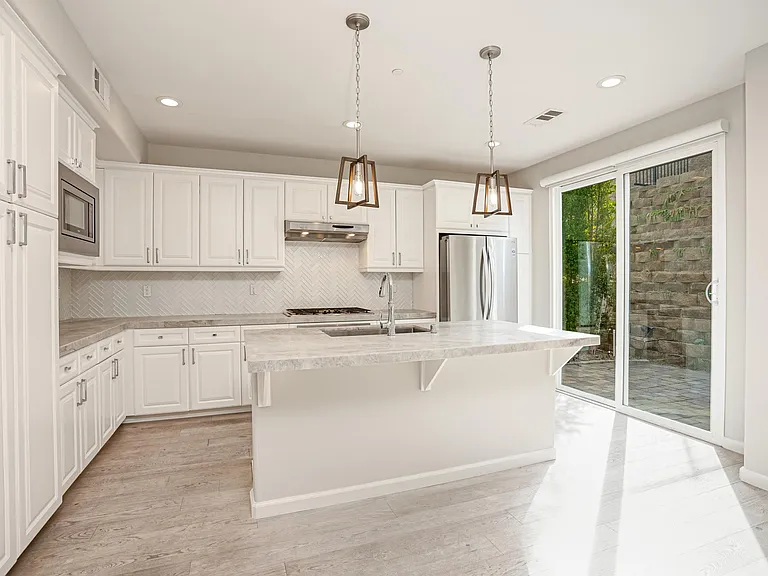 Kitchen with access to backyard