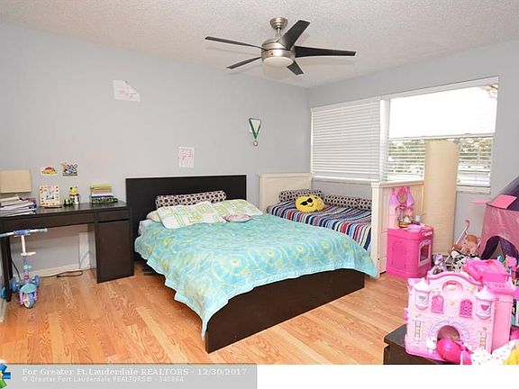 4th image of 12141 Royal Palm Blvd #7E
