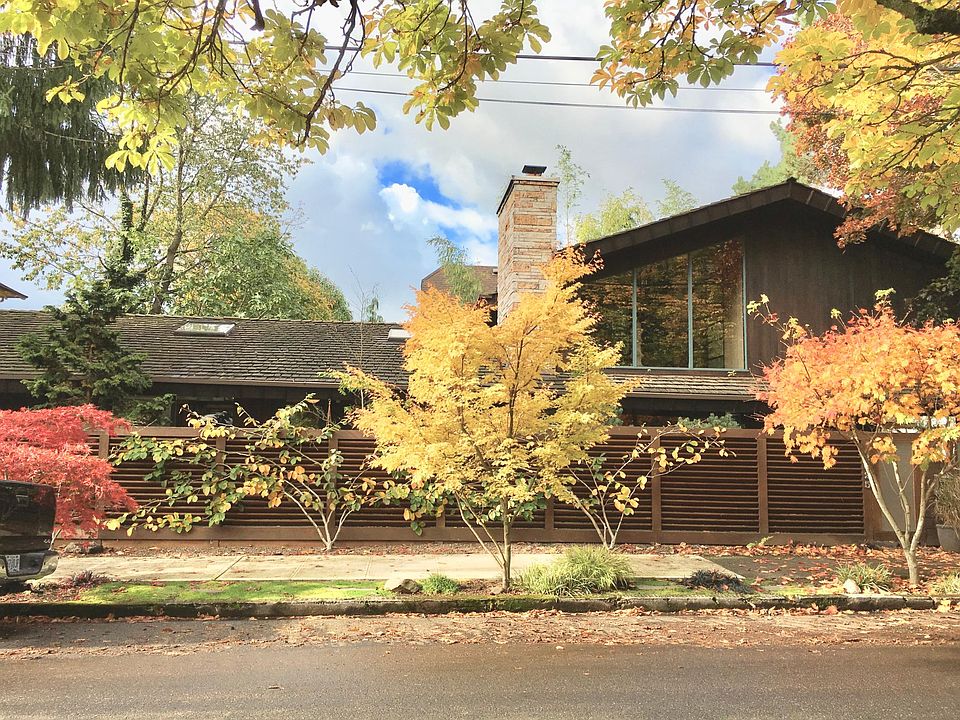 A unique mid-century modern home in Irvington with private yard and Japanese maples in the Fall.