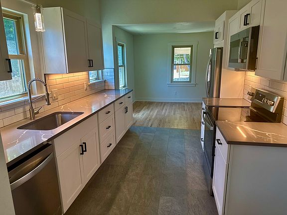 stackable laundry to right of kitchen