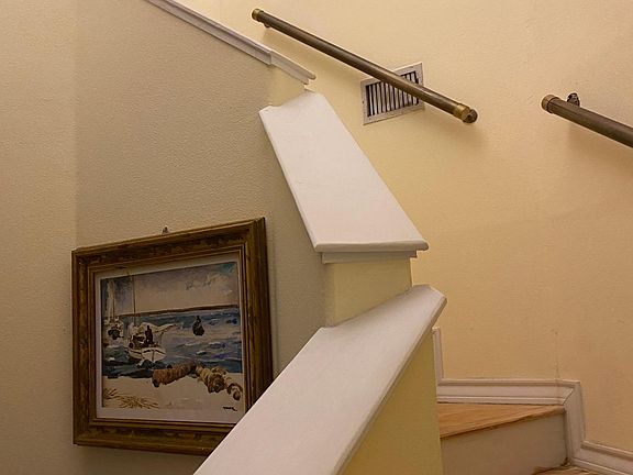 Incredible entry from a winding staircase.