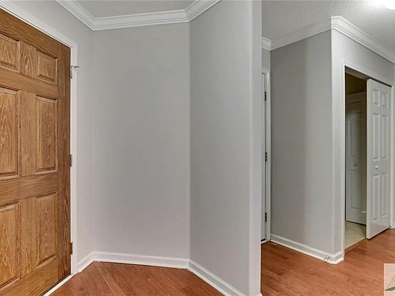 Front foyer, garage entrance, hall laundry and second full bath