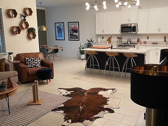 View from living room into kitchen and dining room - open concept