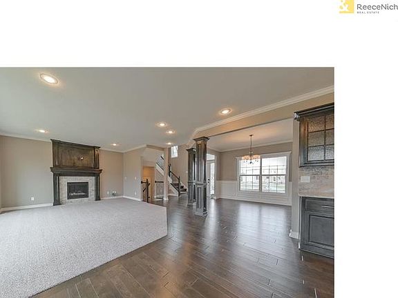 Great Room with oversized gas direct vent sealed until fireplace. Pre-wired for 5-speaker surround sound, security and HDMI under 10'.