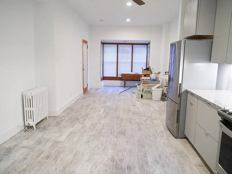 Bright sunny fully renovated. Radiator heat - new high-efficiency boiler.
Central air