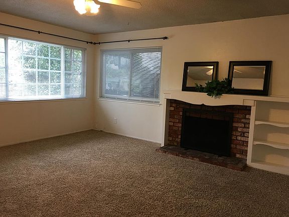 Spacious, open front rooms with fireplace