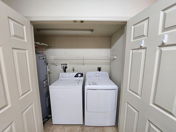 Washer/Dryer in closet off Kitchen
