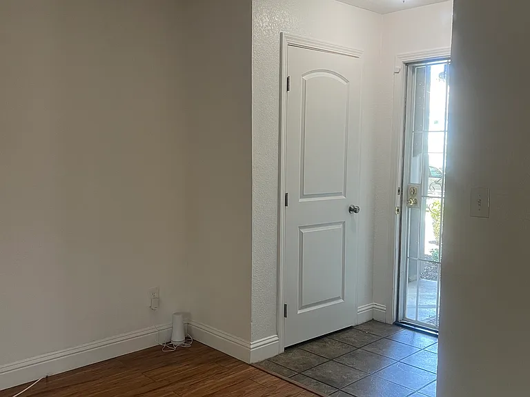 Front door entrance to living room area.