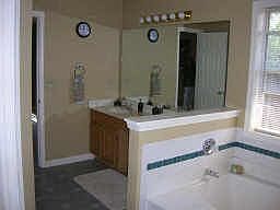 Lg. Master Bath, w/ garden tub and his and hers vanity