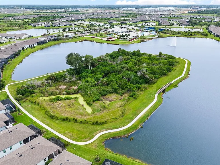 9454 Ballaster Pointe Loop — Photo 45
