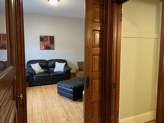 Entryway looking into living room.
