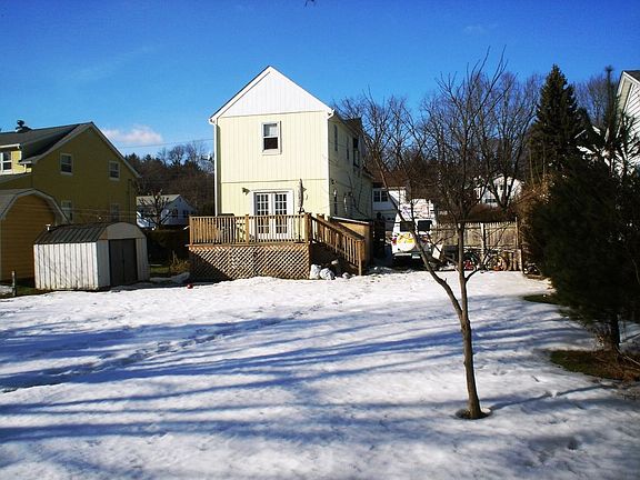 Nice deck off living room and level back yard