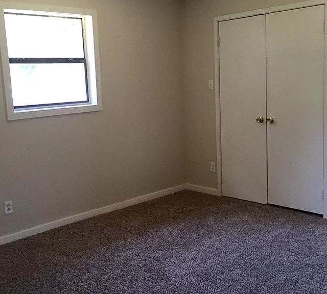 Large spacious bedroom with large closet