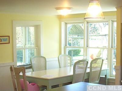 Light filled dining area overlooking the back yard.