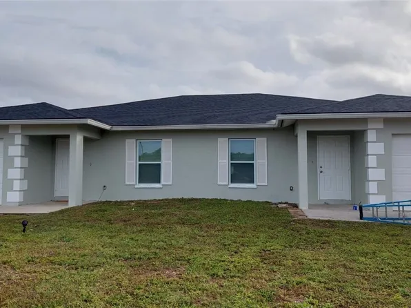 1405/1407 Hightower Ave S, Lehigh Acres, FL 33973