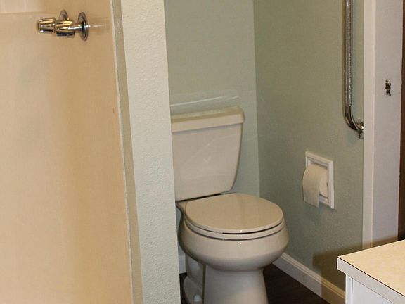 3/4 bath with new floor, paint, trim,toilet and sink