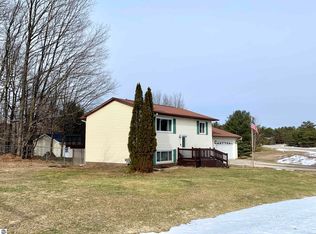 7404 Scotchwood Ln, Grawn, MI 49637