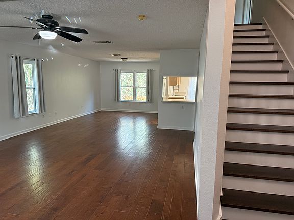 View of the living and dining room from just inside the front door.