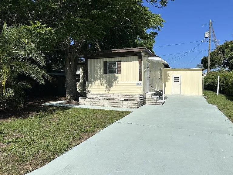 5844 Sunshine Park Dr — Photo 1