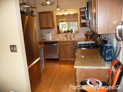 Kitchen
						:
						Granite Counters, Stainless Steel Appliances