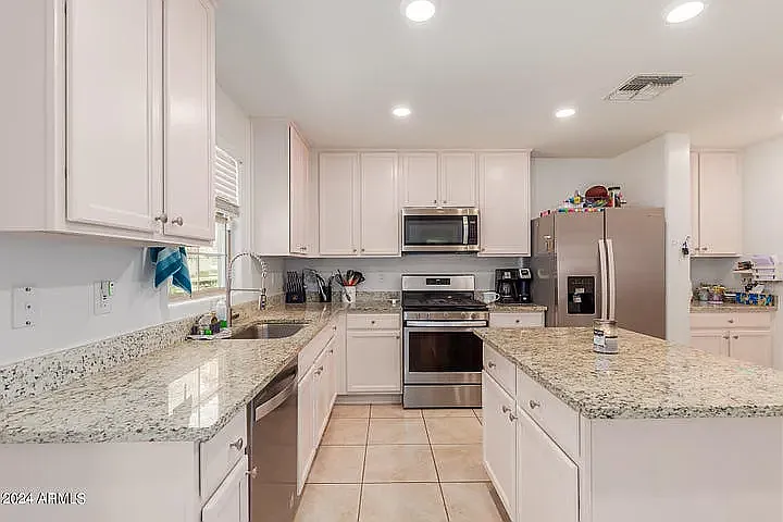 8216 W Albeniz Pl — Photo 9