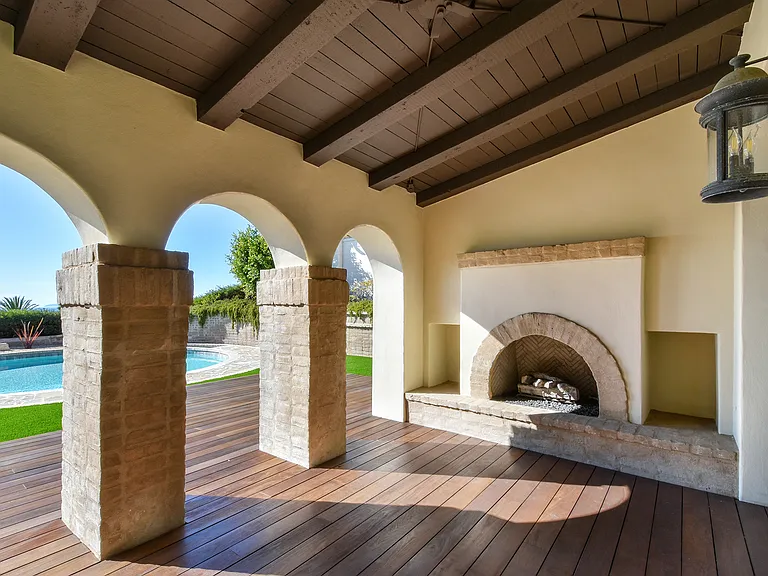 Covered patio area has fireplace and ocean views - with access from Owners Suite