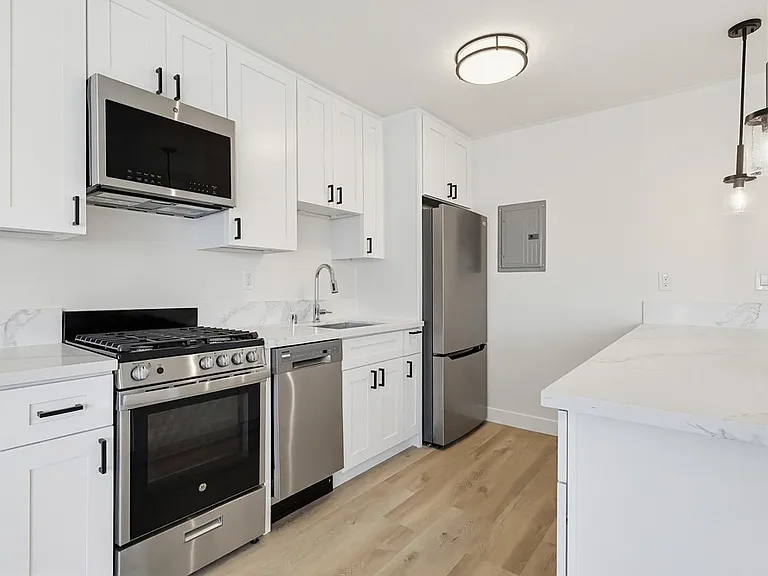 2675 Arlington Ave & 3105 W 27th St — Photo 9