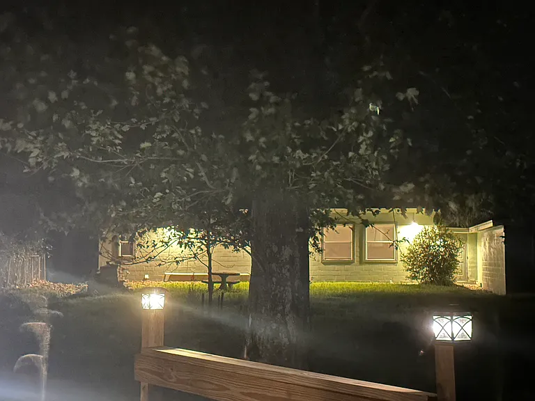 From the Waterside view of Home in the evening hours with the lights..