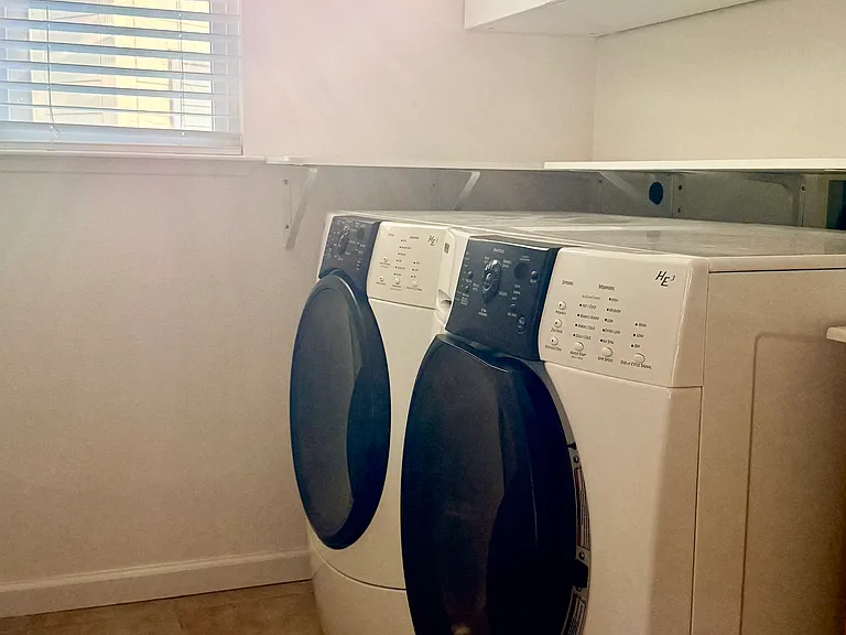 Laundry room with washer and dryer