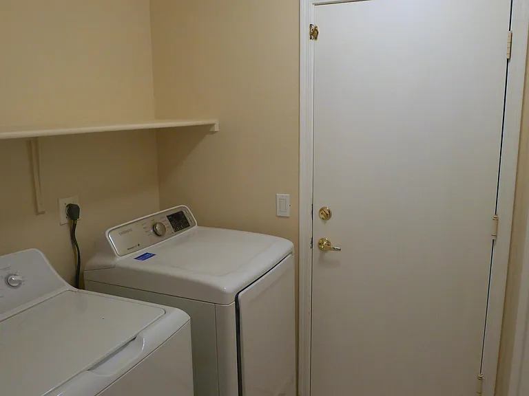 Laundry connecting to 2- car garage.