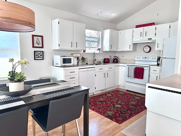 Bright and clean kitchen and dining room available to share