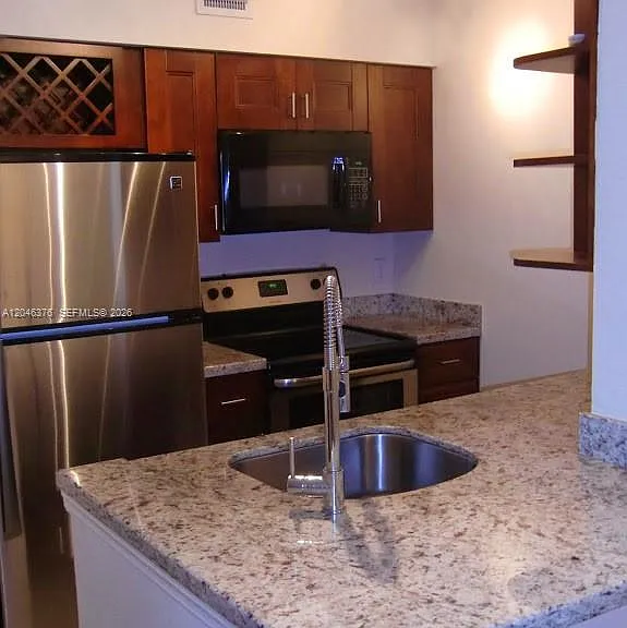 2811 N Oakland Forest Dr #205 — Photo 3
