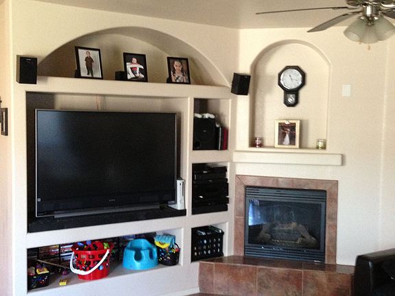 Large living area with built in shelving