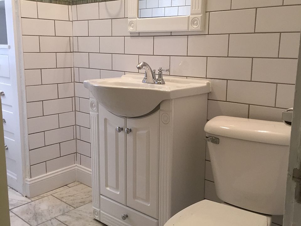 Subway Tiles w Glass Accent. Updated Bathroom