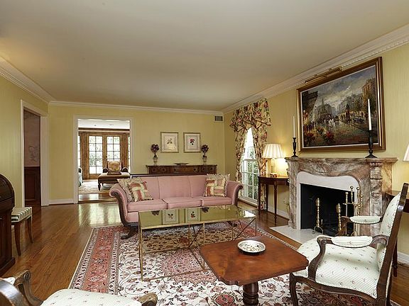 Opposite view of living room showing the flow into the family room.