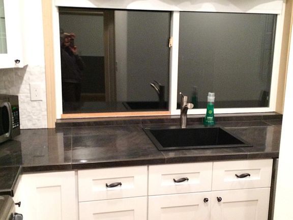 Auto close cabinetry throughout, plus large windows