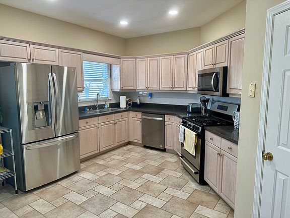 Kitchen includes all appliances. New Countertops to be installed. Has room for eat in table in the kitchen